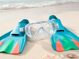 Snorkel mask and fins prepared for a clear South Florida beach morning